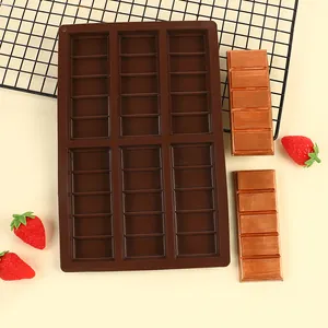 Brown 6-cavity rectangular silicone chocolate mold shown with finished chocolate bars