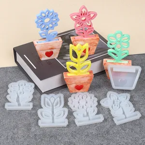 Detail view of sunflower and tulip flower pot silicone molds for DIY resin art