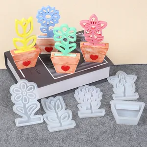 Set of DIY silicone molds for resin flower and pot ornaments featuring sunflower and tulip shapes