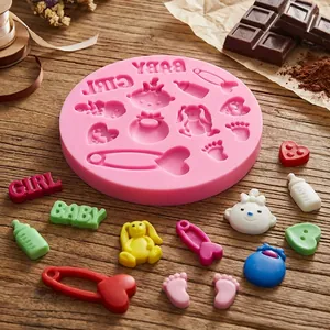 Pink silicone baby-themed mold for fondant and chocolate featuring cute baby girl motifs