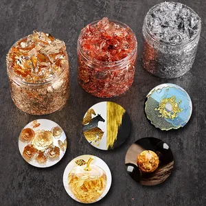 Detail view of gold, silver, and rose gold foil flakes with DIY resin craft examples
