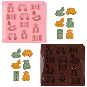 Silicone candy and chocolate molds in pink and brown with bear, car, and rocking horse shapes.
