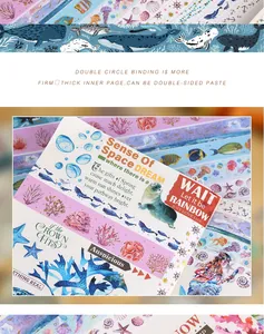 Close-up detail shot of decorative gilded washi tape and stickers with marine ocean themes.