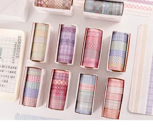 Detailweergave van kleurrijke washi-tapesets met ruitpatroon voor DIY-stationery-stijlen