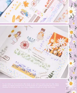 Close-up of creative floral PET washi tapes and stickers applied to a DIY scrapbook page