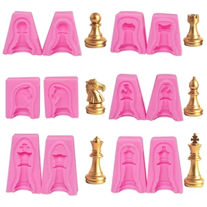 Detailed view of 3D international chess silicone molds alongside finished gold resin pieces