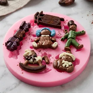 Detail of pink silicone mold with cartoon character chocolate shapes like rocking horse
