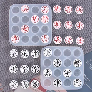 Detail of semi-transparent silicone molds and finished resin Chinese chess pieces