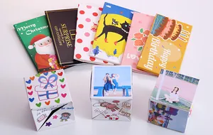 Detail of creative DIY bouncing gift boxes and colorful surprise envelopes for birthdays.