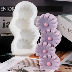 Detailed view of 3D stacked daisy flower silicone mold for handmade candle craft