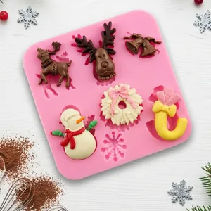 Stampo in silicone natalizio rosa con renne e pupazzo di neve per decorazione torte