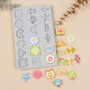 Detail of vintage European pattern silicone mold with colorful fondant sample pieces