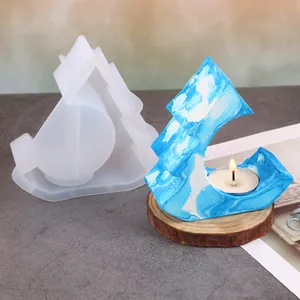 Silicone mold for Christmas tree house candle holder with blue marbled finished item