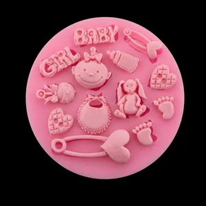 Detailed view of baby girl pink silicone mold featuring cute infant shapes and letters