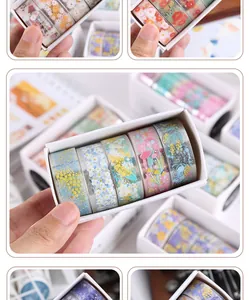 Close-up of floral PET washi tape set in a white gift box for DIY journaling