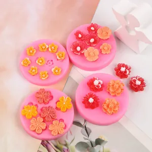 Macro detail of pink silicone flower molds for DIY resin daisies and sunflowers