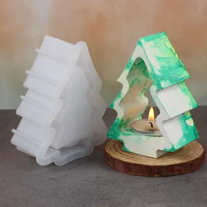 Detail of Christmas tree silicone mold and marbled epoxy candle holder with tea light.
