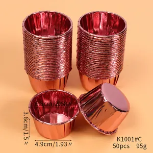 Detailed macro view of metallic rose gold cupcake liners with specific size dimensions for baking.