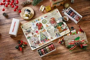 Detail of 6-roll Christmas washi tape set with stickers on a festive journal