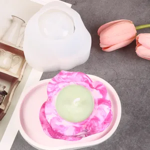 Detail of DIY flower petal silicone mold and finished marbled resin candle holder