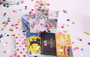 Detailed view of DIY exploding gift boxes and colorful birthday surprise envelopes