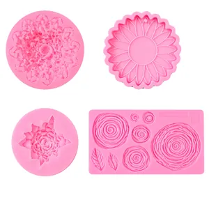 Detailed view of pink flower silicone molds for sunflower and rose cake decorations