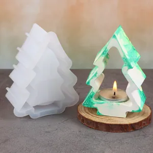 Detail of Christmas tree silicone mold showing both the mold and a finished candle holder.