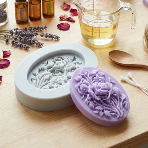 Detailed macro view of oval rose floral silicone mold with finished purple soap