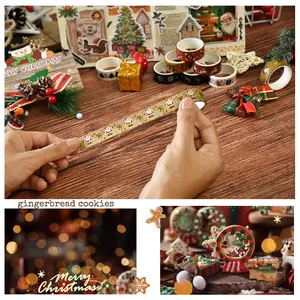 Close-up of hands using Christmas washi tape with Santa Claus pattern for DIY crafts