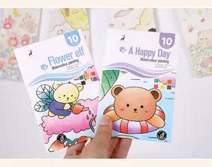 Close-up of compact watercolor painting books with cute bear illustrations for kids