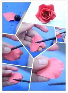 Detail view of fondant petal sculpting tool creating a realistic sugar rose.