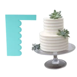 Teal scalloped edge cake scraper for DIY cream frosting decoration and textured finish