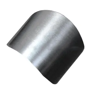 Close-up detail of a durable stainless steel finger guard for safe vegetable slicing