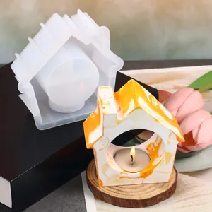 Silicone house candle holder mold with finished orange marble resin craft and tealight candle