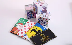 Detail view of colorful DIY surprise explosion jumping boxes and gift envelopes