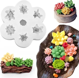 Detail view of 7-cavity succulent silicone mold with colorful finished wax crafts
