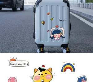 Detailed view of cute waterproof PVC stickers on a suitcase showing vibrant patterns
