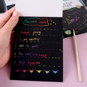 Colorful DIY rainbow scratch-off art paper notebook with wooden stylus for kids creativity