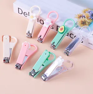 Cute cartoon portable nail clippers in various pastel colors and creative floral designs