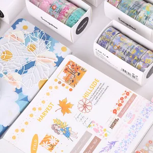 Decorative PET washi tape set with floral patterns for DIY journaling and scrapbooking.