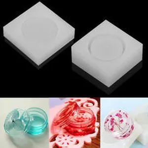 Stampo in silicone per scatola tonda in resina con alcuni esempi di prodotti finiti