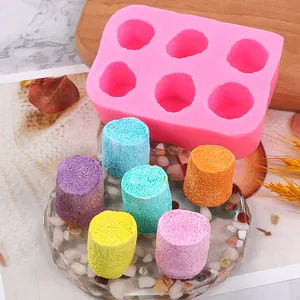 Detail view of 6-cavity pink silicone mold for DIY marshmallow squishy toys and clay crafts