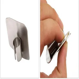 Detailed view of stainless steel finger guard protector for safe kitchen cutting and slicing