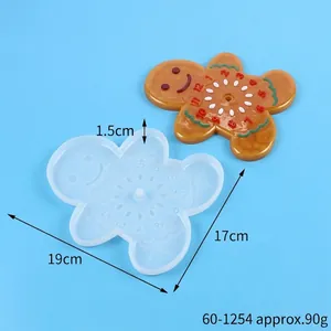 Gingerbread man shaped silicone mold for DIY resin clock making, showing 19cm by 17cm dimensions