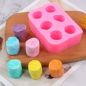 Detailed view of pink 6-cavity marshmallow silicone mold for DIY clay and fidget toys