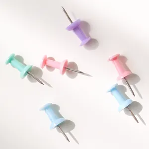Colorful I-shaped push pins for cork boards and office photo walls.