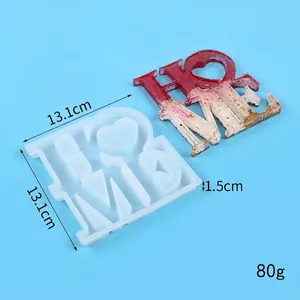 Close-up of silicone HOME letter mold with dimensions and finished resin piece