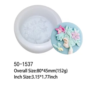 Silicone mold with finished flower girl relief detail for DIY cake decorating or candle making