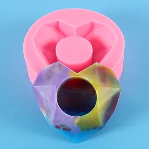 Close-up of a geometric heart-shaped silicone mold for DIY succulent pots and candles