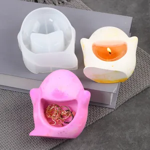 Detailed view of DIY ghost-shaped silicone mold with candle and jewelry holder results